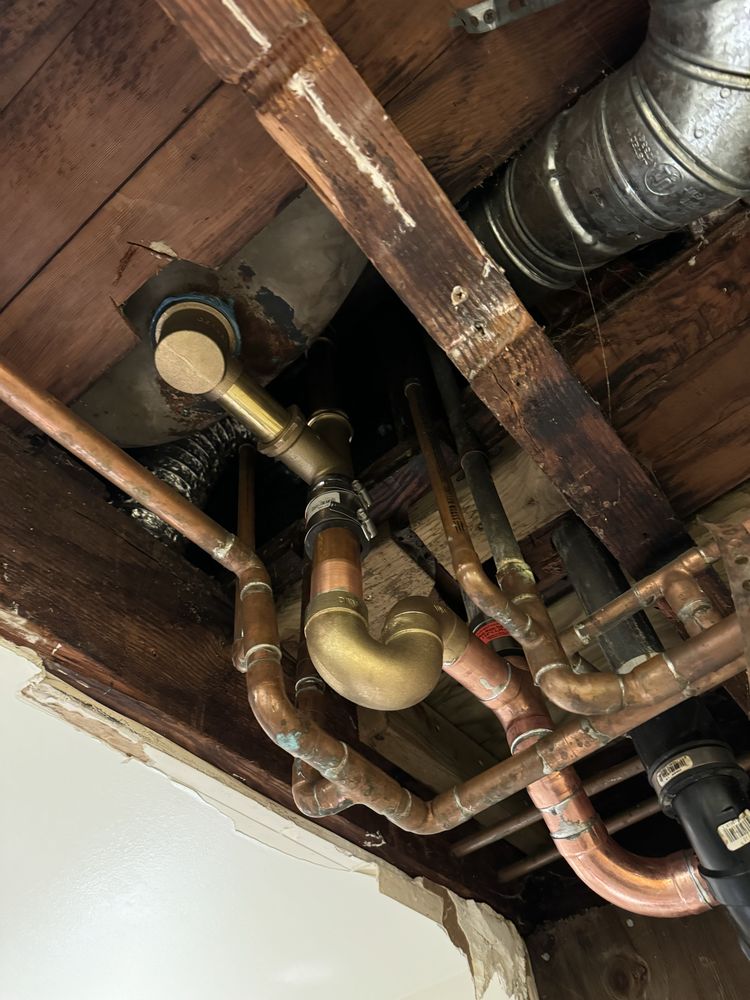 Copper drain and supply line rebuild in ceiling joist bay
